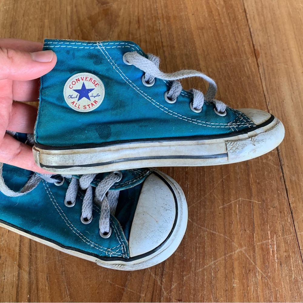 Blue high top converse